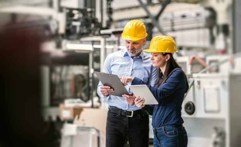 An industrial man and woman engineers